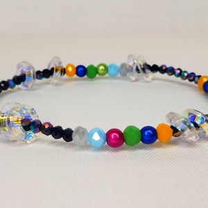 Danity Floating Angel Ring Bracelet with Multi-Color Satin Luster Beads.