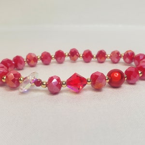 Rode Rondelle Crystal kralen armband met Floating Crystal Angel Ring.