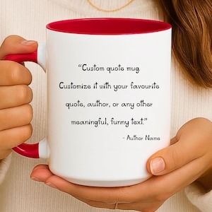 May include: White ceramic mug with a red interior and handle. The mug features the text "Custom quote mug. Customize it with your favourite quote, author, or any other meaningful, funny text." and "- Author Name."