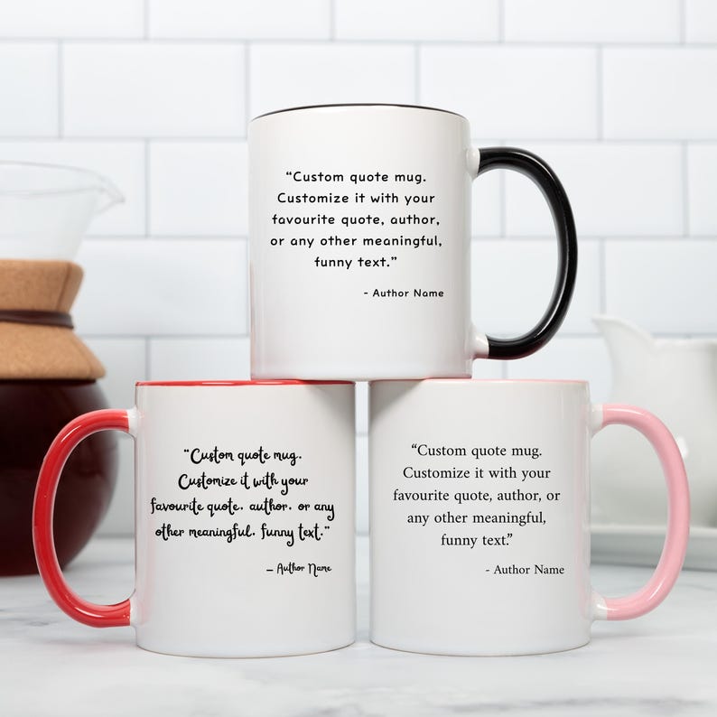 May include: A white ceramic mug with a black handle and the text "But First, Coffee" in a bold, black font. The mug is sitting on a wooden surface. The mug is approximately 4 inches tall.