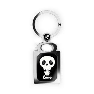 Rectangle Keyring with Mary Magdalene Love Skull logo, black and white.
