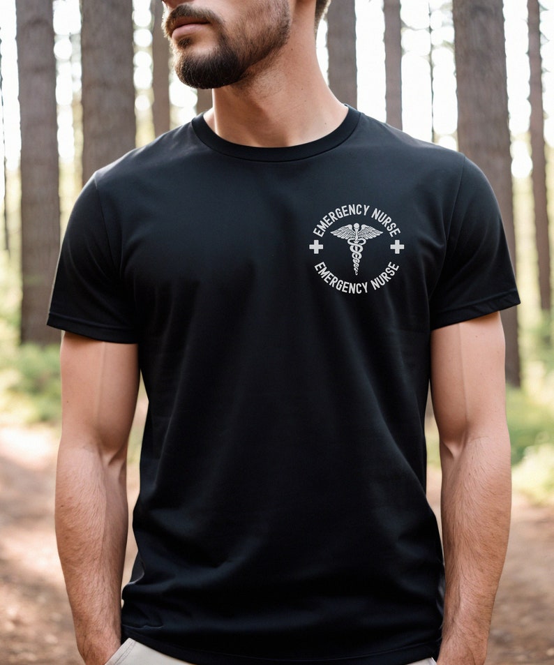 May include: A black t-shirt with a white graphic of a medical symbol and the text "Emergency Nurse" on the front.
