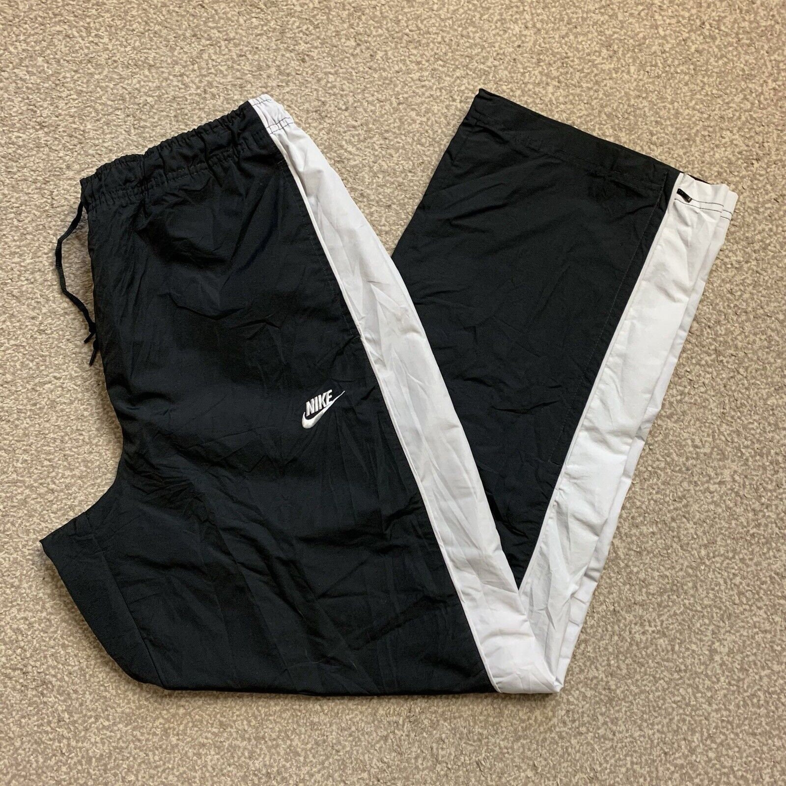 All black nike tracksuit bottoms sales