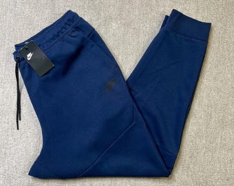 Navy nike tracksuit bottoms sales
