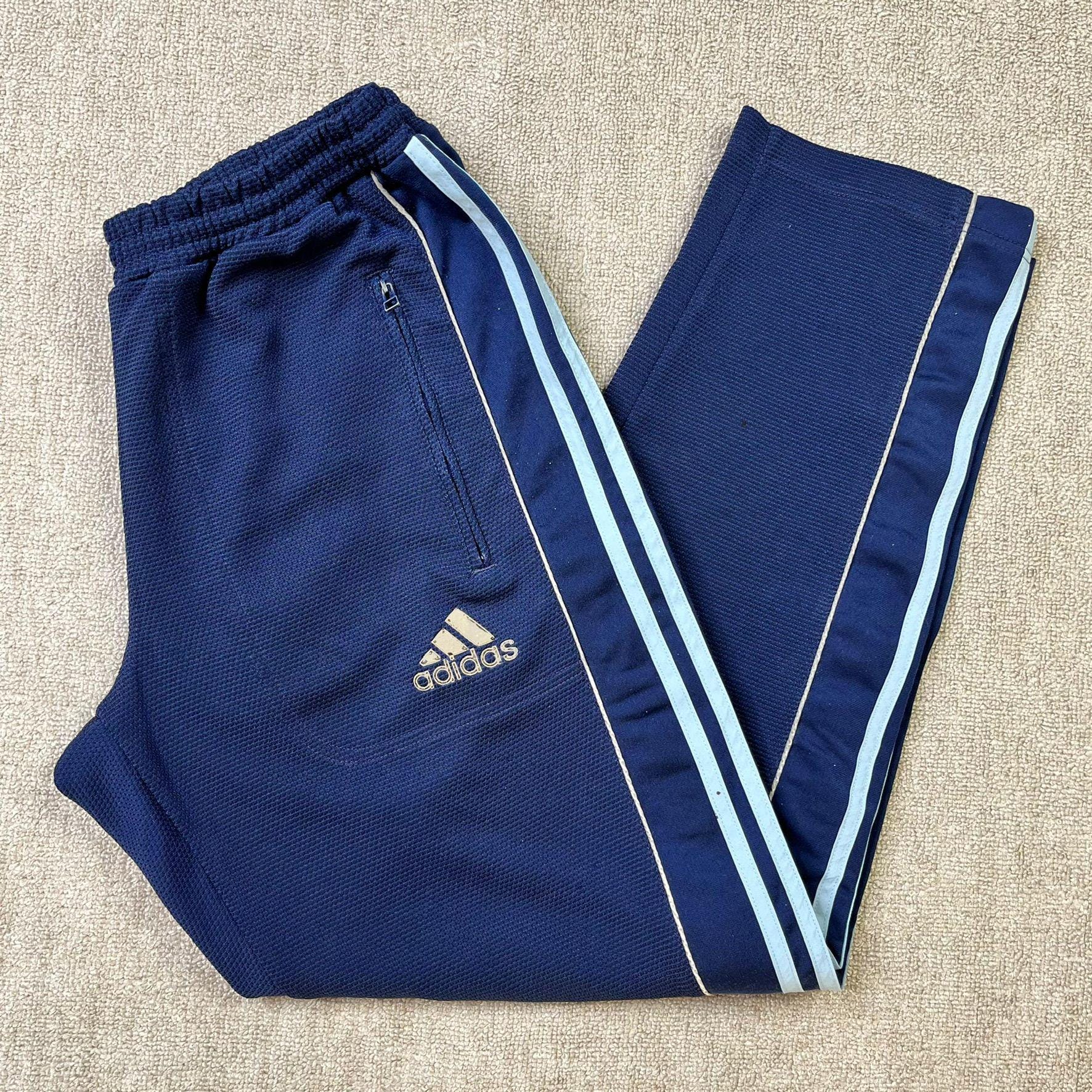 adidas tracksuit bottoms with poppers