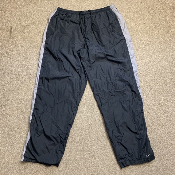 Nike 2000's baggy pinstripe cuffed track bottoms (S) – Uppernostril