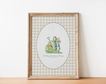 May include: Framed print featuring a watercolor illustration of Peter Rabbit with a watering can and a bunny. The artwork is set against a gingham background and includes the text "For all things without complaining and arguing".