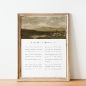 May include: A framed print featuring a vintage landscape painting at the top and a poem titled "Blessed Assurance" below. The poem reads: "Blessed assurance, Jesus is mine..."