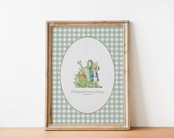 May include: Framed print featuring a watercolor illustration of Peter Rabbit with a watering can and a bunny. The background is a green and white gingham pattern. The text at the bottom reads, "Do all things without complaining and arguing."
