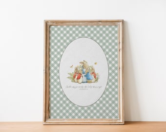 May include: A framed print featuring a watercolor illustration of rabbits in a pastoral scene. The artwork is set within an oval shape against a green and white checkered background. The frame is made of wood. The print includes text at the bottom.