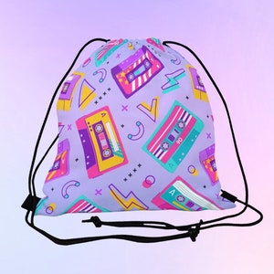 May include: A purple drawstring bag with a retro pattern of colourful cassette tapes and geometric shapes.