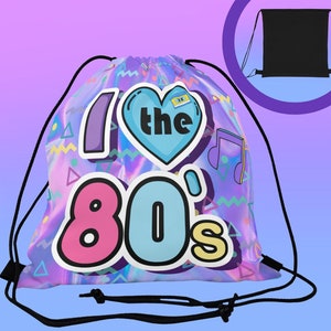 May include: A holographic drawstring bag with a pink, blue, and yellow design. The bag features the text "I love the 80's" with a heart and music notes.