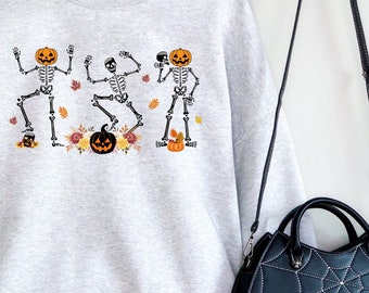 Lustiges Skelett Sweatshirt mit Rundhalsausschnitt, langärmeliger Halloween Pullover, niedlicher Blumen Kürbis Pullover, übergroßes Sweatshirt der Herbstsaison