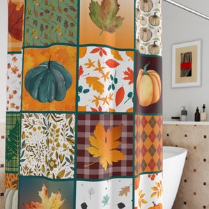 May include: A shower curtain with a patchwork design featuring autumn leaves, pumpkins, and plaid patterns in shades of orange, green, brown, and white.