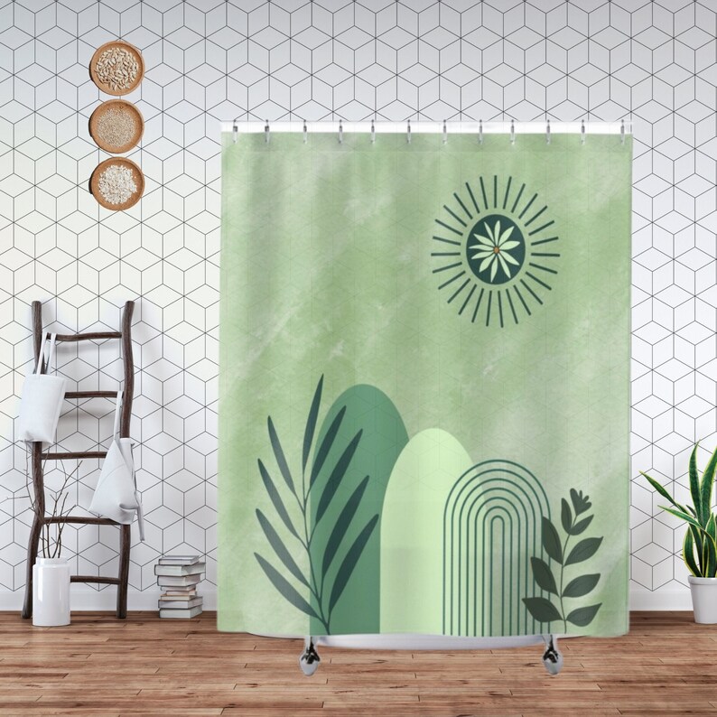 May include: Green shower curtain with a modern abstract design featuring a sun, arches, and leaves. The background is a light green watercolor wash.