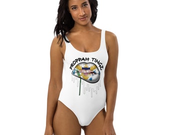 One-Piece Swimsuit: White. Virgin Islands flag lip design. Brand name- black.