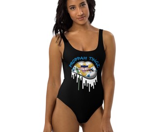 One-Piece Swimsuit: Black. Virgin Islands flag lip design. Brand name- light blue.