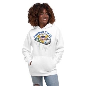 Unisex Premium Hoodie: White. Virgin Islands flag lip design. Brand name- blue.