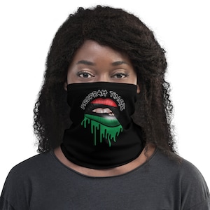 Neck Gaiter: Black. Pan African Flag Lip Design. Brand Name- Black/White Tracing.