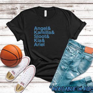 May include: Black t-shirt with blue text: Angel & Kamilla & Sloot & Kia & Ariel. Includes a basketball, white sneakers, and blue jeans. Text at the bottom says "AVAILABLE IN KIDS SIZES".