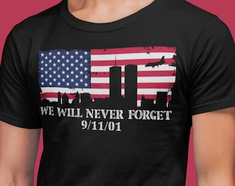 Nous n'oublierons jamais le 11 septembre avec une image d'un drapeau américain en détresse et le t-shirt Twin Towers