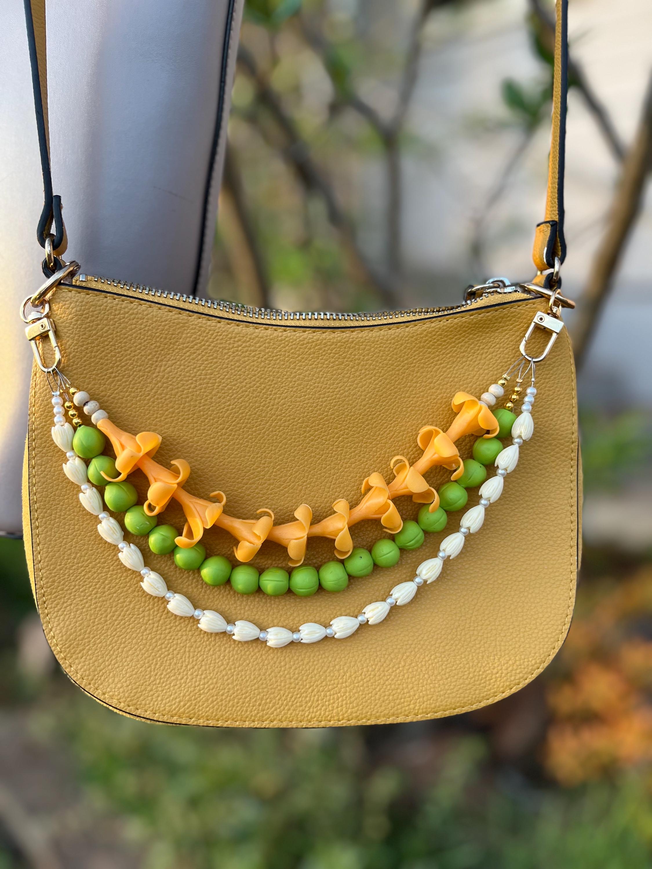 The KAIOLANA Purse Lei Set - Hula Bag Charm, Puakenikeni, Mokihana