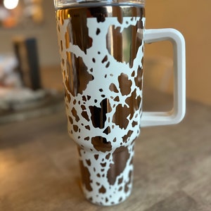Cowhide Wrap Laser Engraved on a Stainless Steel 40oz/30oz Tumbler or 30oz Flip Top Water Bottle. Lots of colors. Great Gift.