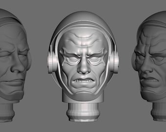 May include: A 3D printed model of a head wearing a helmet with a detailed face. The head has a furrowed brow, closed eyes, and a stern expression. The helmet has a smooth, rounded shape with a small, circular detail on each side.