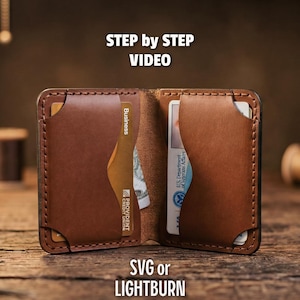 May include: Open brown leather wallet with multiple card slots. The wallet contains a business card and a U.S. Department of Veterans Affairs ID card. The text "STEP by STEP VIDEO" and "SVG or LIGHTBURN" are visible.