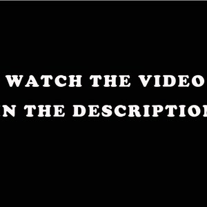 May include: Black and white text on a black background that reads "WATCH THE VIDEO IN THE DESCRIPTION."