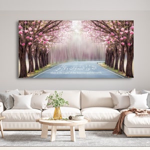 Islamic wall art canvas print featuring Ayah 35 of Surat An-Noor &quot;Allah Nur Alsamawat Wa Alard&quot;, cherry blossom path background