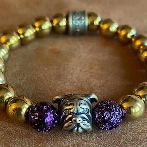 Dog head Bracelet. Gold and purple beaded bracelet