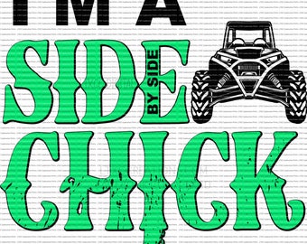 May include: Green and black graphic text that reads "I'm a Side By Side Chick" with a black and white illustration of a side-by-side vehicle.