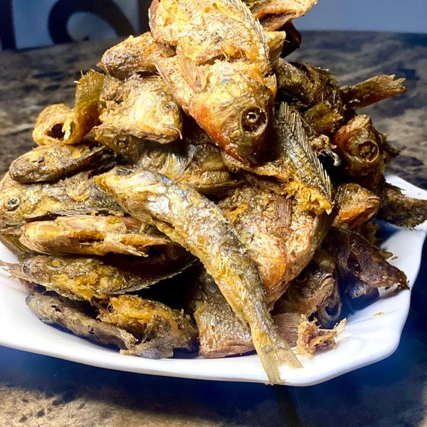 Fried baby tilapia/ One Man Thousand/ Ghana Fish/ One Mouth Thousand