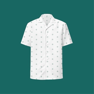 May include: A white short-sleeved button-down shirt with a green and white pattern of small circles.