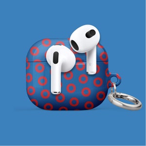 May include: A blue and red donut-patterned case for wireless earbuds with a silver keychain. The case has two white earbuds inside.