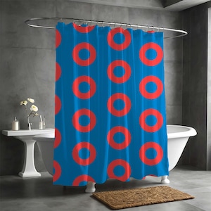Puede incluir: Cortina de ducha azul con un patrón repetido de anillos rojos en forma de rosquilla.