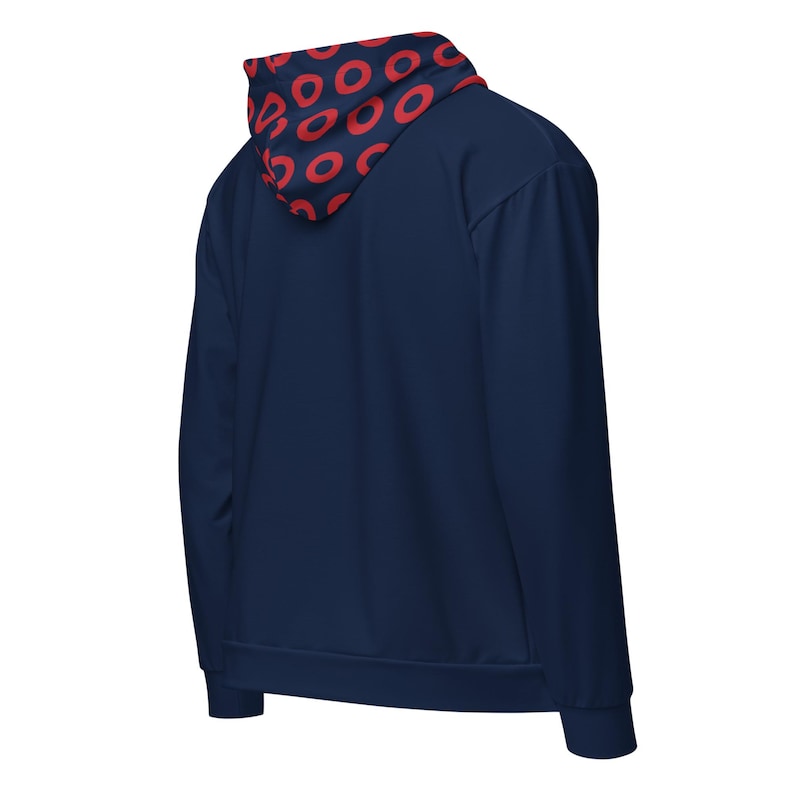 May include: Navy blue hoodie with a red circular pattern on the hood lining. The hoodie has a full zip and long sleeves. The back view of the hoodie is shown.