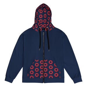 May include: Navy blue zip-up hoodie with a red circular pattern on the hood and pocket lining. The hoodie has a black zip and drawstrings. A casual, comfortable garment.