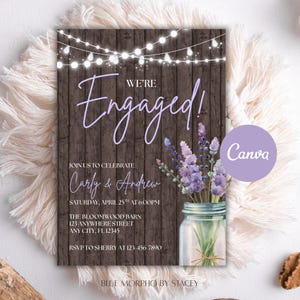 May include: An engagement announcement card with a rustic wood background. The words "We're Engaged!" are in a soft purple script. The card includes event details and a mason jar with lavender. The Canva logo is visible.