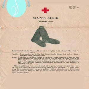 May include: Vintage knitting pattern for a man's sock, medium size. The document features a Red Cross symbol and text. Includes instructions, equipment needed, and scale details. From Sommer Vintage Co.