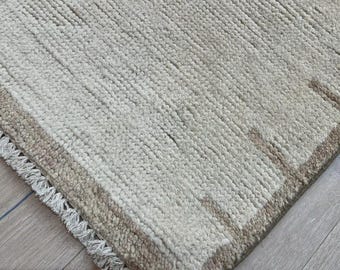 Hand Knotted Beige Wool Rug: Minimalist Border, Custom Size