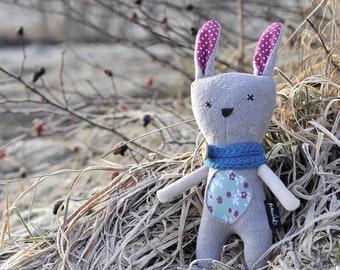 Light grey rag bunny with pink ears, stuffed bunny toy