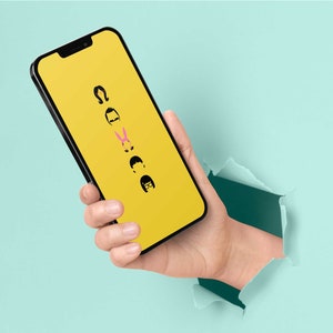 May include: A yellow smartphone with a black screen displaying a wallpaper of black and white cartoon characters. The characters are in a vertical line and include a woman with a pink bow, a man with glasses, and a man with a mustache.