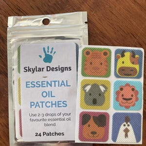 May include: A pack of essential oil patches by Skylar Designs. The patches are square and feature colourful animal designs, including a bear, giraffe, koala, lion, dog, and chicken. The pack contains 24 patches.