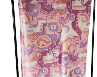 May include: A pink, orange, and purple geometric patterned fabric with a white background. The fabric is draped over a black metal stand.
