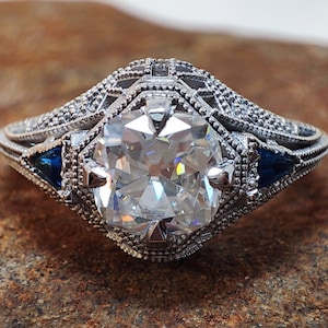 Milgrain Moissanite Engagement Ring: OEC Cushion Cut & Blue Sapphire Silver Anniversary Ring