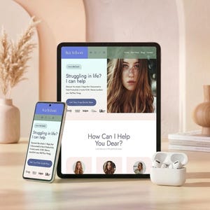 May include: A tablet and a smartphone displaying a website for a life coach named Ava Wilson, featuring text that reads Struggling in life? I can help and How Can I Help You Dear? alongside a pair of white wireless earbuds in a charging case.