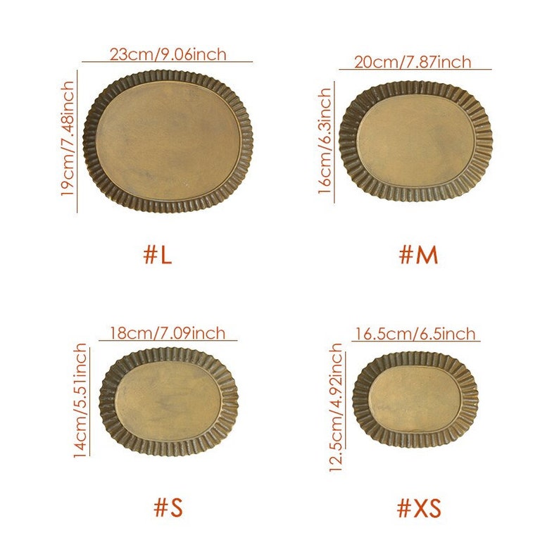 May include: Four oval-shaped, gold-colored metal trays with scalloped edges. The trays are labeled with sizes: XS, S, M, and L. The measurements for each tray are listed in inches and centimeters.