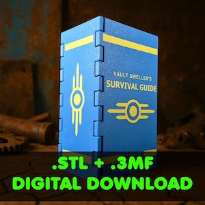 Könnte beinhalten: Eine blaue Box mit gelben Akzenten und dem Text "VAULT DWELLER'S SURVIVAL GUIDE". Die Box hat ein einzigartiges ineinandergreifendes Design und ein Logo. Der untere Teil des Bildes lautet ".STL + .3MF DIGITAL DOWNLOAD".